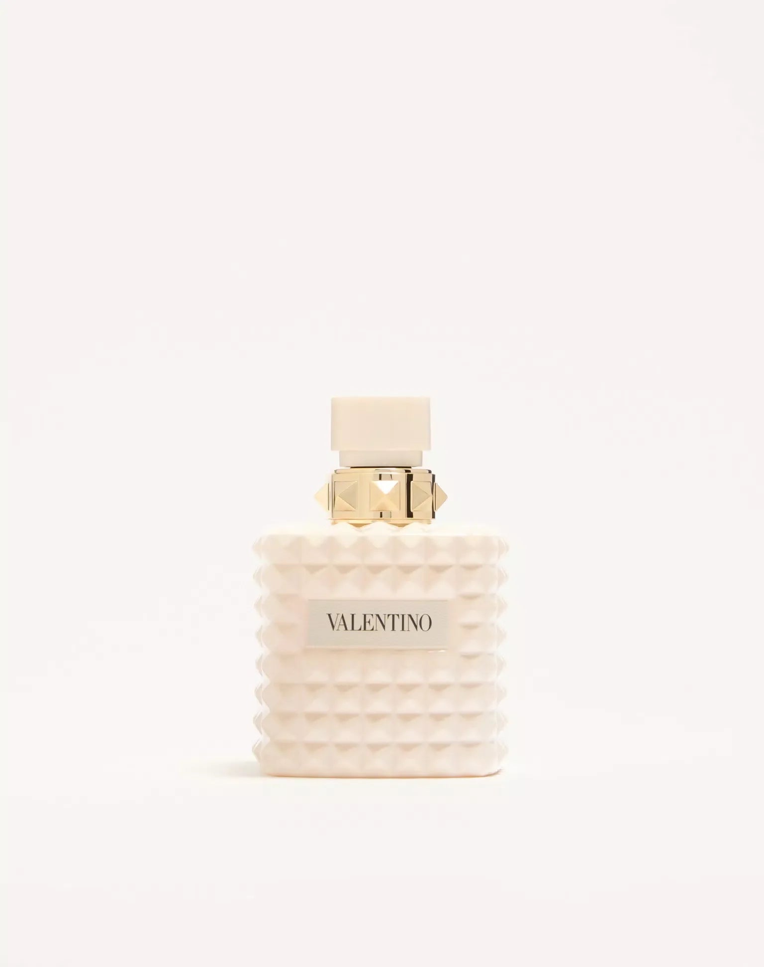 Valentino perfume bottle and packaging on a white background