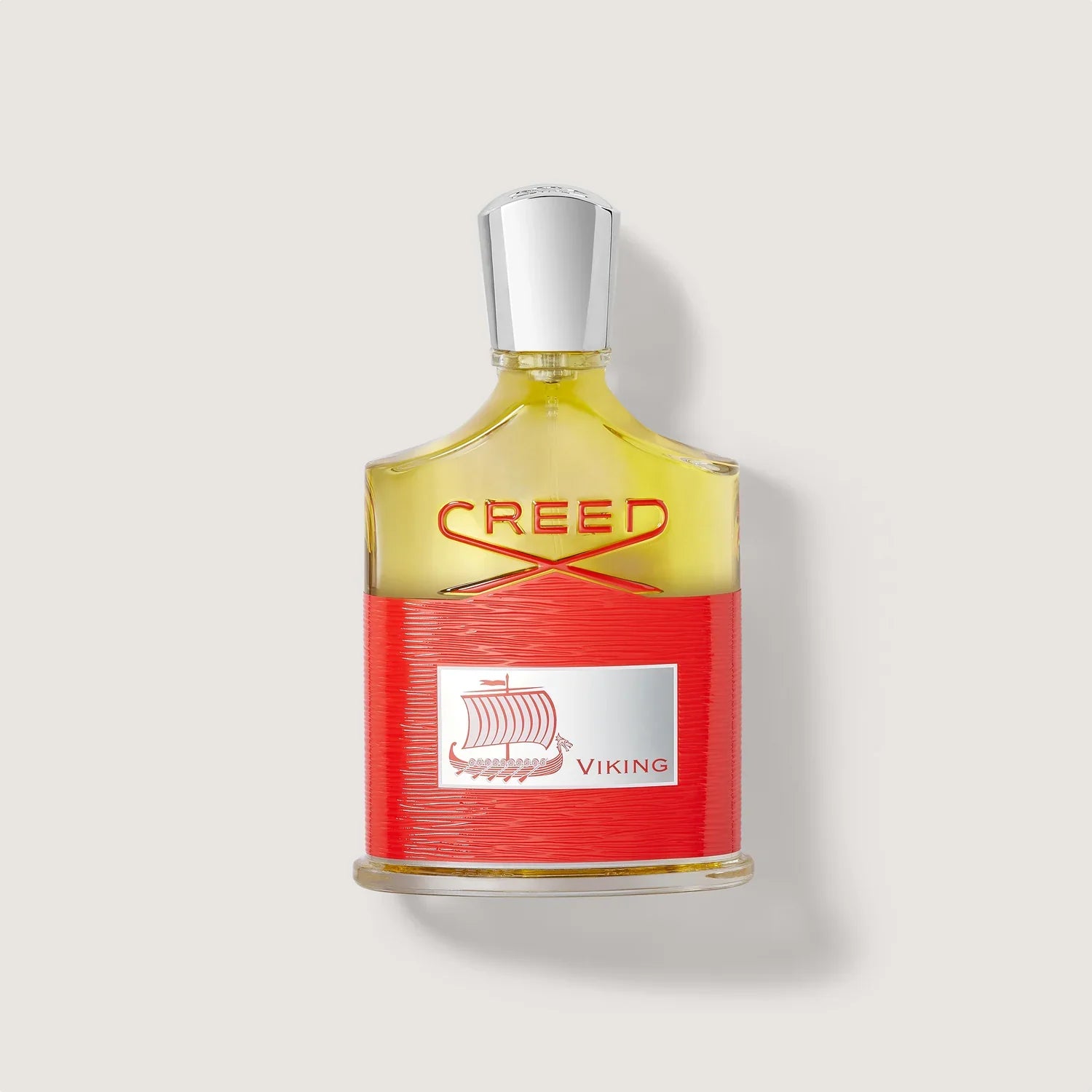 Creed Viking perfume bottle on a light gray background