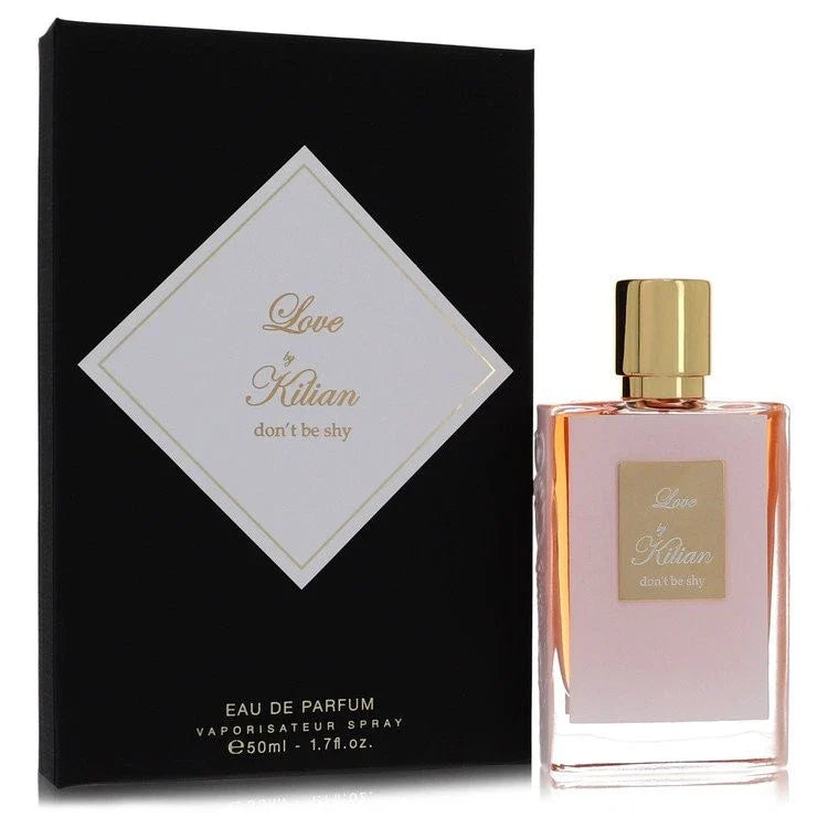 Perfume bottle and packaging of Love K�lian 'don't be shy' on a white background