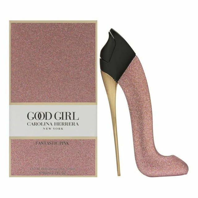 Pink high-heeled shoe with 'Good Girl' Carolina Herrera packaging