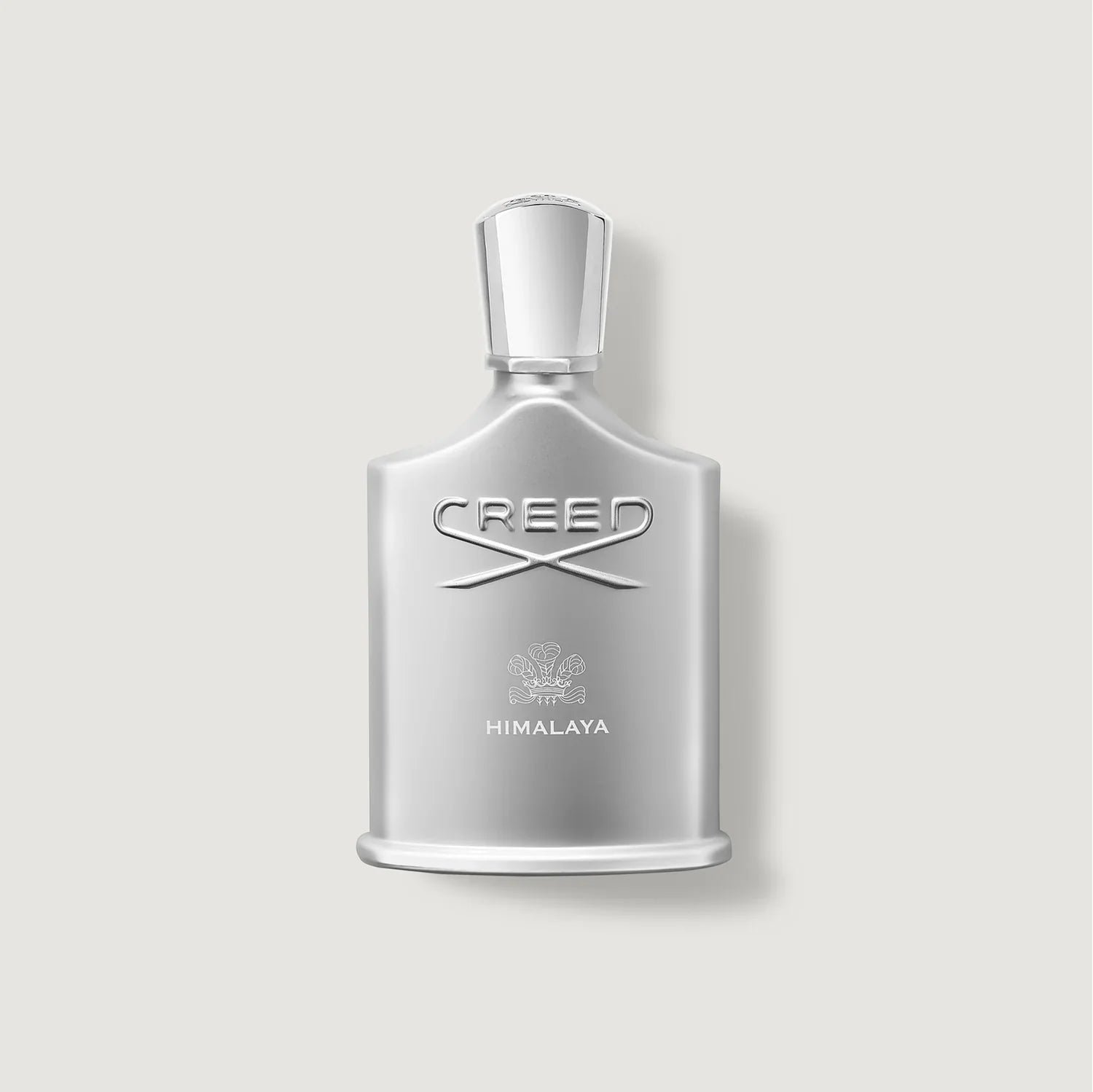 Silver Creed Himalaya perfume bottle on a light gray background