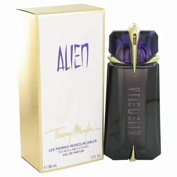 Thierry Mugler Alien perfume bottle and packaging on a white background